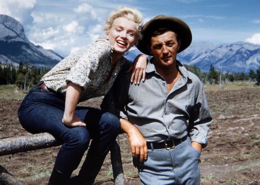 Roberts Mičums un Merilina Monro filmā "River of no Return" (1954)