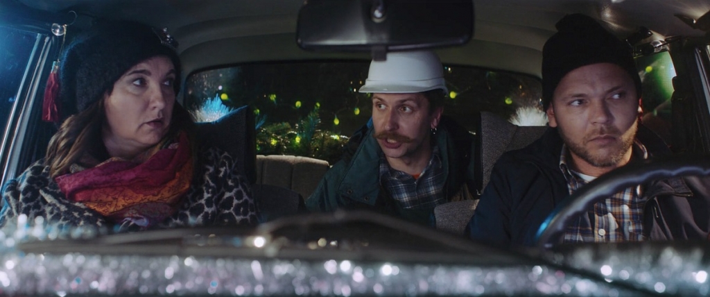 Baiba Sipeniece-Gavare, Mārtiņš Kozlovskis (Kozmens) un Lauris Reiniks filmā "Jaungada taksometrs 2"